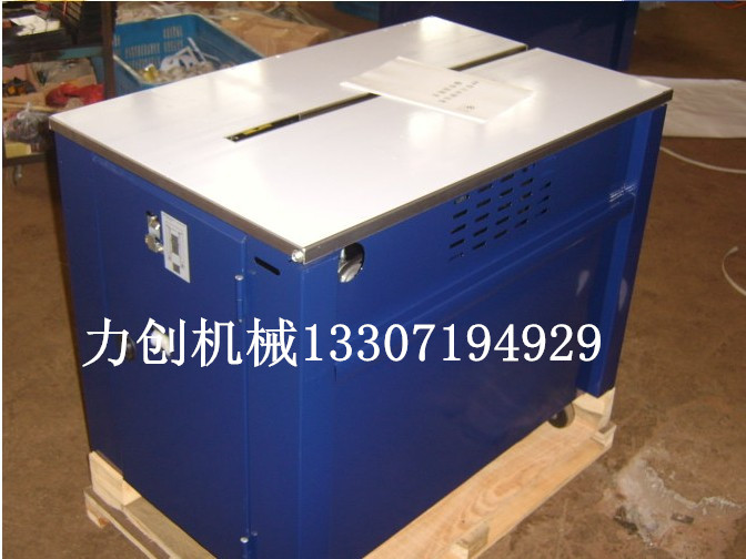 武漢青山制藥廠紙箱打包機(jī)，漢南酒廠紙箱打包機(jī)，漢陽(yáng)服裝廠捆扎打包機(jī)