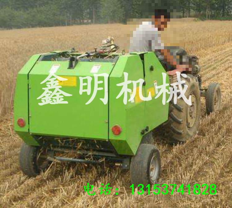 多功能麥秸稈打捆機型號 鑫明拖拉機帶行走式打捆機圖片