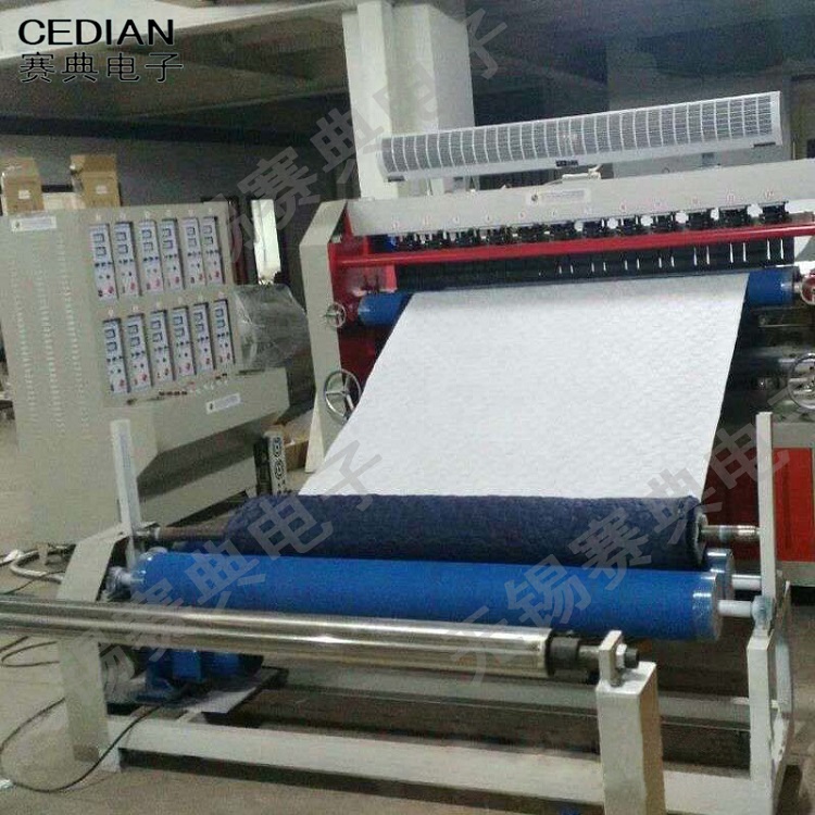 直銷超聲波面料無(wú)線絎縫機(jī),復(fù)合壓花壓棉機(jī)，全自動(dòng)壓花機(jī)