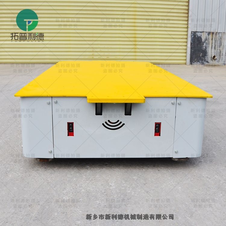 湖北廠家到現(xiàn)場指導(dǎo)安裝100噸無軌電動平車，無軌轉(zhuǎn)彎電動平車